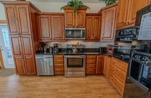 Wind Over Waves House | Accessible Semi-Soundfront: Pool, Hot Tub, Game Rm, Elevator, Boat Ramp, Linens