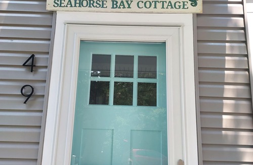 Villas House | All New Seahorse Bay Cottage walk to bay beach and view world famous sunsets!