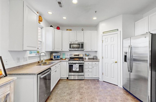 Villages of Five Points House | Angela's Eclectic Villa: 3BR, 2.5BA - Sleeps 7 - Community Pool - Minutes from the Beach