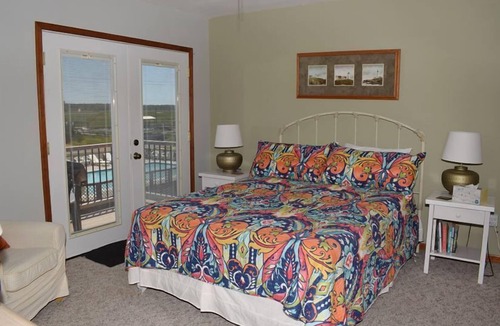 Chincoteague House | Assateague Vista- Waterfront Views of Lighthouse, Pool, Shared Dock Access