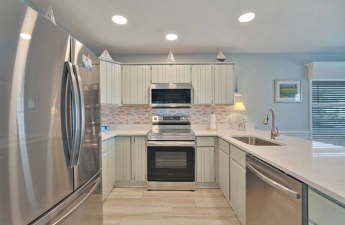 Captain's Cove House | Bay Breeze by Seaside Vacations & Sales
