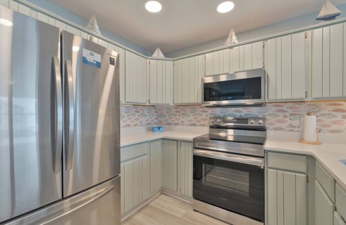 Captain's Cove House | Bay Breeze by Seaside Vacations & Sales