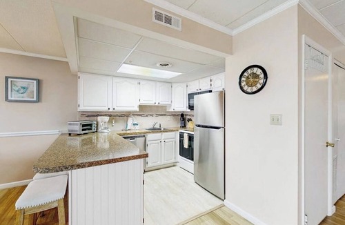 Ocean City Condo | Bayfront condo with marina views and access to shared pool - walk to beach