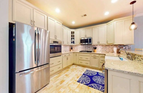 Bayside House | Bayside Resort condo with pools, saunas, athletic courts, on-site golf, and pier