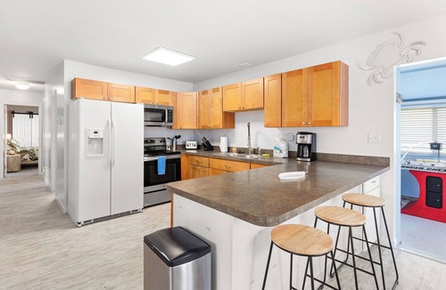 Caine Woods House | Bayside Tiki Summary: