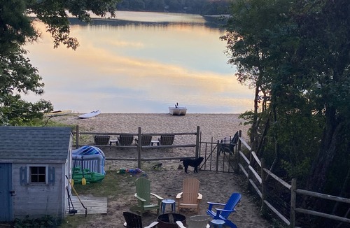 East Falmouth House | Beach front! fenced yard, dogs welcome, central air, fire pit, 3 kayaks, hot tub