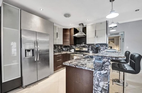 Hendricks and Venice Isles Apartment | Beach Isles Modern 1BR Waterfront Apartment with Patio