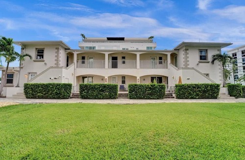 Hendricks and Venice Isles Apartment | Beach Isles Modern 1BR Waterfront Apartment with Patio