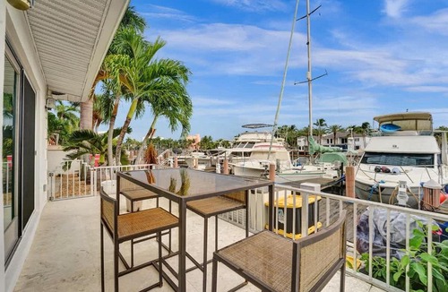 Hendricks and Venice Isles Apartment | Beach Isles Modern 1BR Waterfront Apartment with Patio