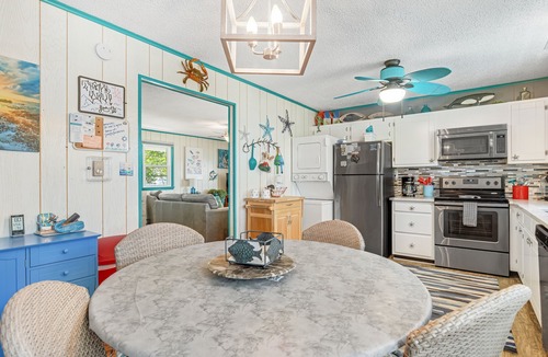 North Ocean City House | Beach-Themed Canal-Front Home w/Private Deck, Dock, Water Views, Free WiFi