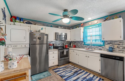 North Ocean City House | Beach-Themed Canal-Front Home w/Private Deck, Dock, Water Views, Free WiFi