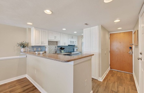 Northeast Virginia Beach Apartment | Beachfront Condo/Pool/Surfing/Fishing/Surf