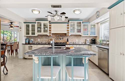 Birch Park Finger Streets House | Beautiful Beach House with pool, lush tropical landscaping steps from the ocean