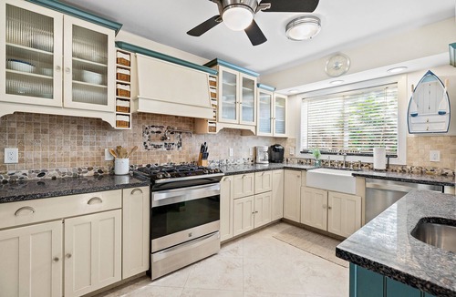 Birch Park Finger Streets House | Beautiful Beach House with pool, lush tropical landscaping steps from the ocean