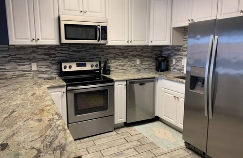 North Ocean City Condo | BEAUTIFUL & CLEAN! Waterfront condo with epic sunsets and a POOL!