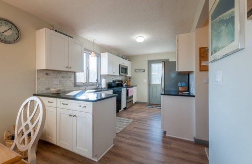 Sagamore Beach House | Beautiful home across the street from Sagamore Beach with ocean views