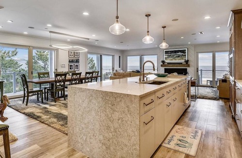 Rehoboth by the Sea Condo | Beautiful Oceanfront Condo with large wrap around deck!
