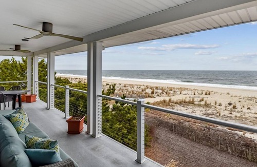 Rehoboth by the Sea Condo | Beautiful Oceanfront Condo with large wrap around deck!