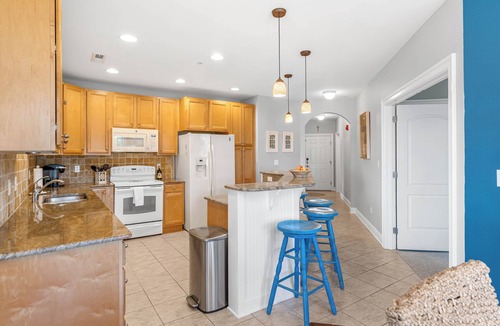 Sun Ridge Condo | Beautifully Decorated 4-Bedroom, 3-Bathroom Pet Friendly Condo with Elevator Access: Walk to all Freeman Stage, Pools, Fitness Center and More in the amenity-rich Bayside Resort and Golf Community.