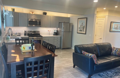 Commercial Street Condo | Best Patio on Commercial-Tropical Garden-Prime Location