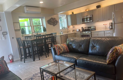 Commercial Street Condo | Best Patio on Commercial-Tropical Garden-Prime Location