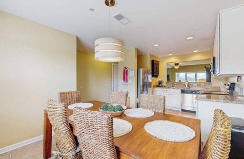 Ocean View Condo | Bethany Bay condo with bay views, athletic courts, pool, fireplace, & balcony