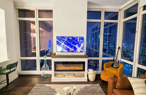 Hell's Kitchen Apartment | Breathtaking NYC Skyline Apartment 2BR 2BA with Fireplace