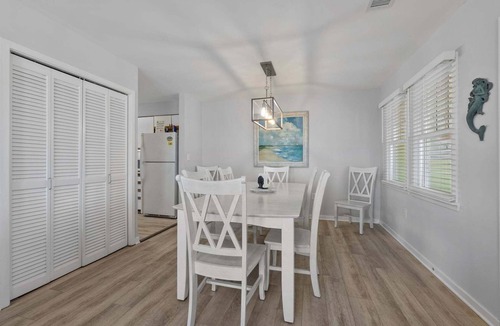 Buxton House | Bright Buxton townhouse with pool access, fast WiFi, AC, W/D & ocean views