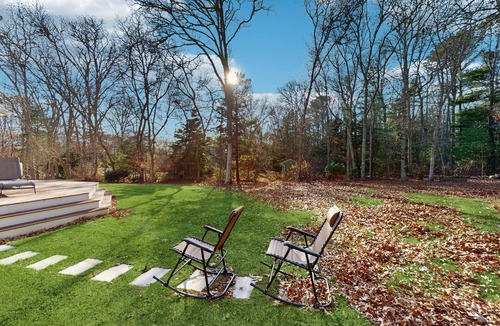 West Falmouth House | Bright coastal home close to the beach with deck, yard, AC & outdoor shower