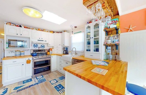 Montego Bay House | Canal front home with free WiFi, deck, private dock, shared pool & tennis