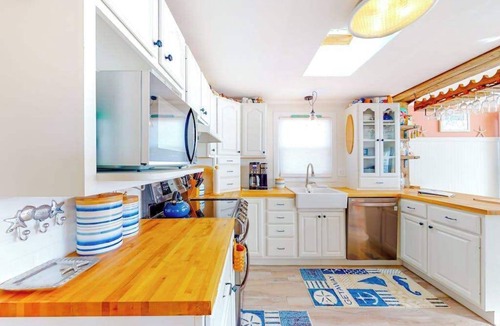 Montego Bay House | Canal front home with free WiFi, deck, private dock, shared pool & tennis