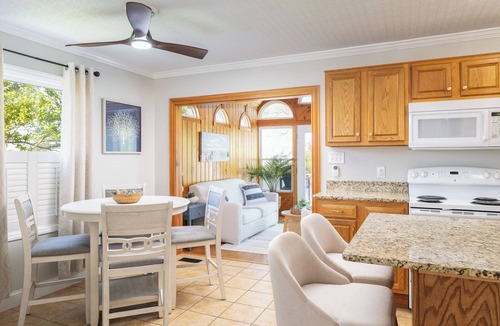 Colington Harbour House | Canal front Retreat with Kayaks, Paddle boards and Fire pit. Newly Furnished!