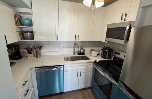 Eastern Shores Condo | Canal-front two-bedroom condo near Sunny Isles
