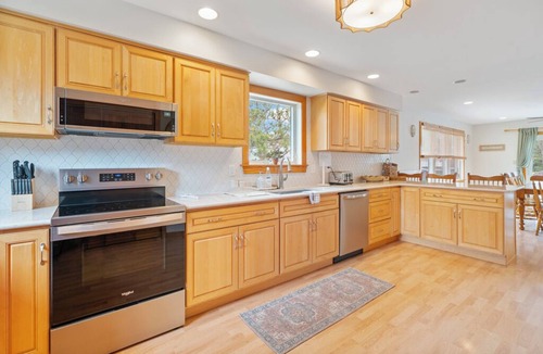Deep Hole House | Canalfront home with Screened Porch by Seaside Vacations & Sales
