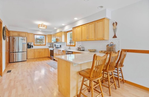 Deep Hole House | Canalfront home with Screened Porch by Seaside Vacations & Sales