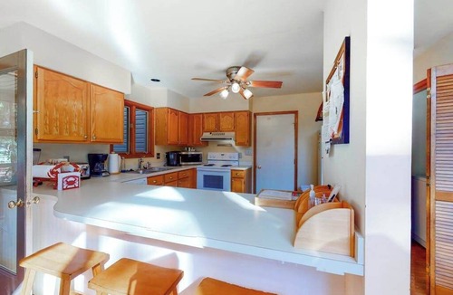 Ocean Pines House | Canalside Home in Ocean Pines with Large Deck, Canoes, Kayaks & Shared Pools