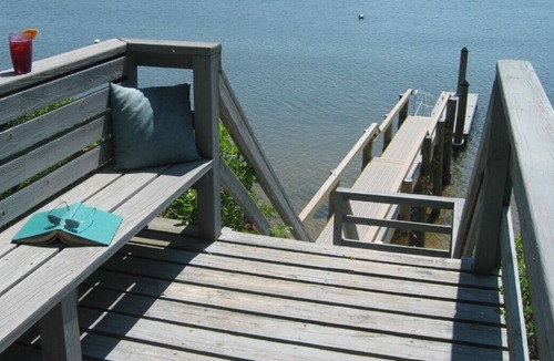 Mashpee Neck House | Cape Cod Waterfront Vacation Home dock and 2 kayaks: