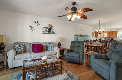 Chincoteague House | Charlie's Bayside Retreat | South Main Waterfront w/Private Boat Slip, Screened Porch & Pets