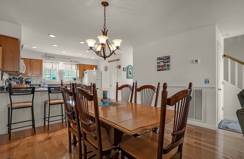Chincoteague House | Charlie's Bayside Retreat | South Main Waterfront w/Private Boat Slip, Screened Porch & Pets
