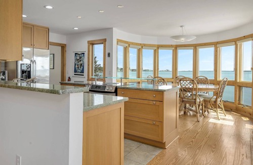 Chincoteague House | Charlotte's Morning Sun | Luxury Oyster Bay Waterfront w/Unobstructed Views, Screened Porch & Dock