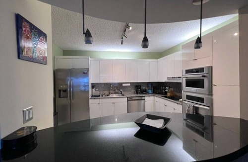 Surfside Condo | Charming 2-bedroom Luxury Condo on the sand with amazing unobstructed views.