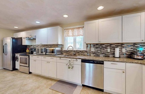 Buzzards Bay House | Charming coastal home with sunny rooms, private backyard, & walk to beach