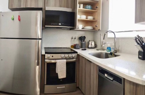 Downtown Hollywood Apartment | Charming DBL w/pool& parking 15 min to FLL & Beach