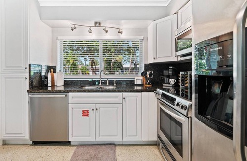 Poinsettia Heights House | Charming Florida Oasis with Private Yard, Backyard Bar & Near Vibrant Hotspots