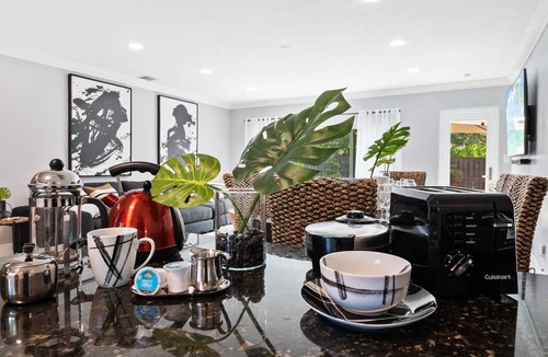 Poinsettia Heights House | Charming Florida Oasis with Private Yard, Backyard Bar & Near Vibrant Hotspots