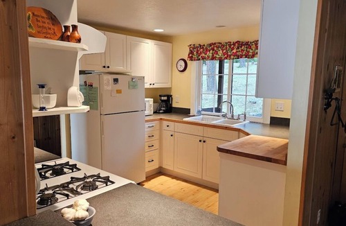 Big Arm House | Charming Lake Front Home with Deck, Dock, Beach and Spectacular Views