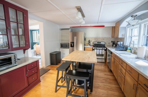 Commercial Street House | Charming West End home with brand new bathrooms and secluded patio