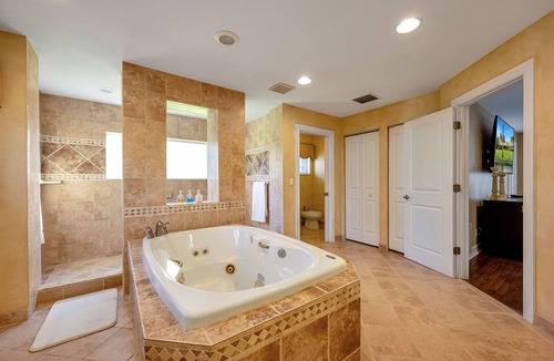 Parkland House | City Oasis is a Gorgeous Home with a Pond, Pool table, Poker, and Heated Pool!