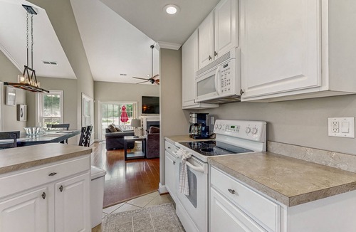 Ocean Pines House | Coastal resort with pool, golf, fireplace, W/D, sunroom & beach access