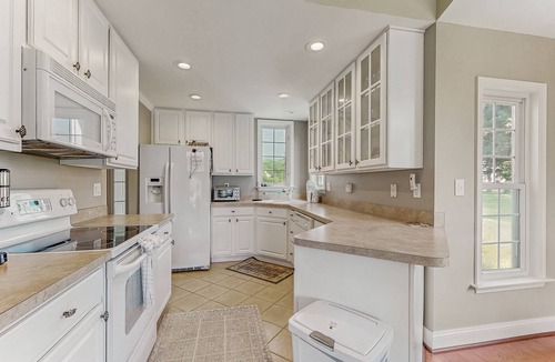 Ocean Pines House | Coastal resort with pool, golf, fireplace, W/D, sunroom & beach access